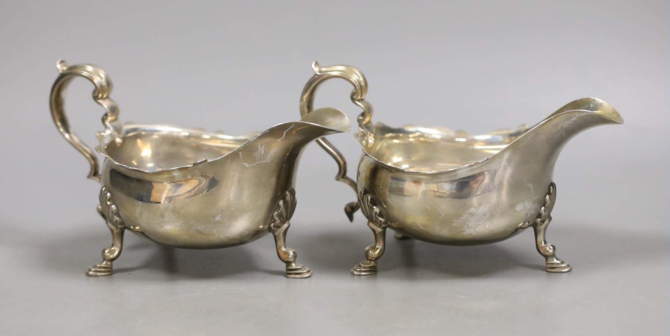 A pair of George V silver sauceboats, P.G. Dodd & Son, London, 1927, 15oz.